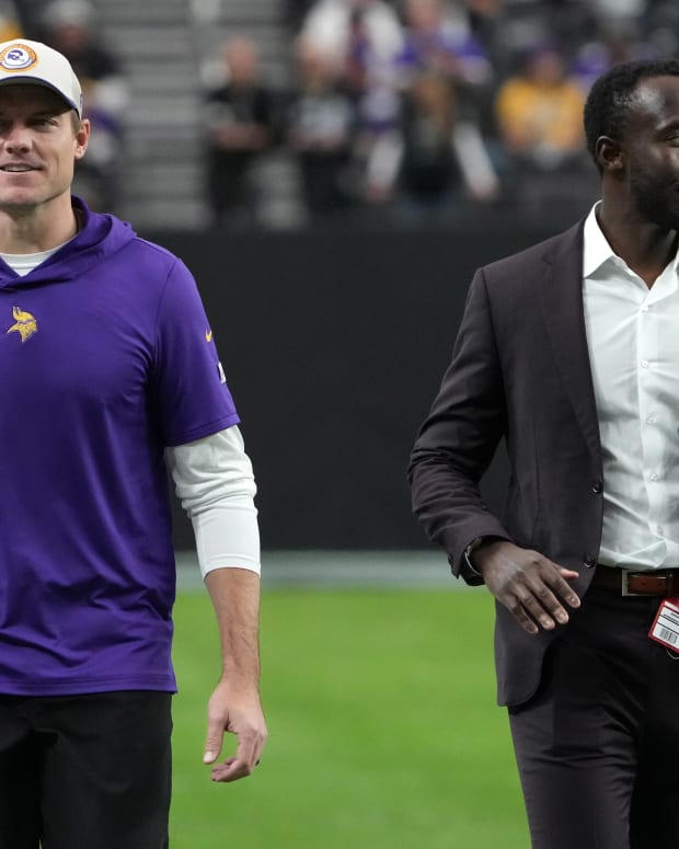 Dec 10, 2023; Paradise, Nevada, USA; Minnesota Vikings coach Kevin O'Connell (left) and general manager Kwesi Adofo-Mensah react during the game against the Minnesota Vikings at Allegiant Stadium.